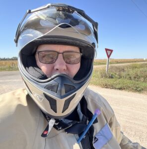 Selfie of Ralph wearing motorcycle gear.